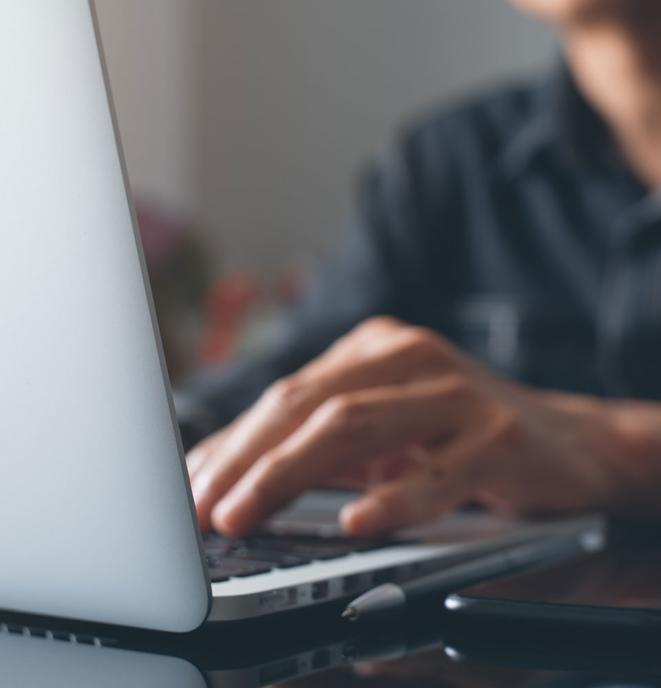 close up of person on their laptop