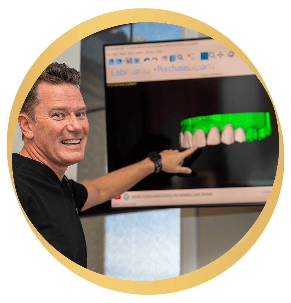 Doctor Pointing to 3d scan of teeth