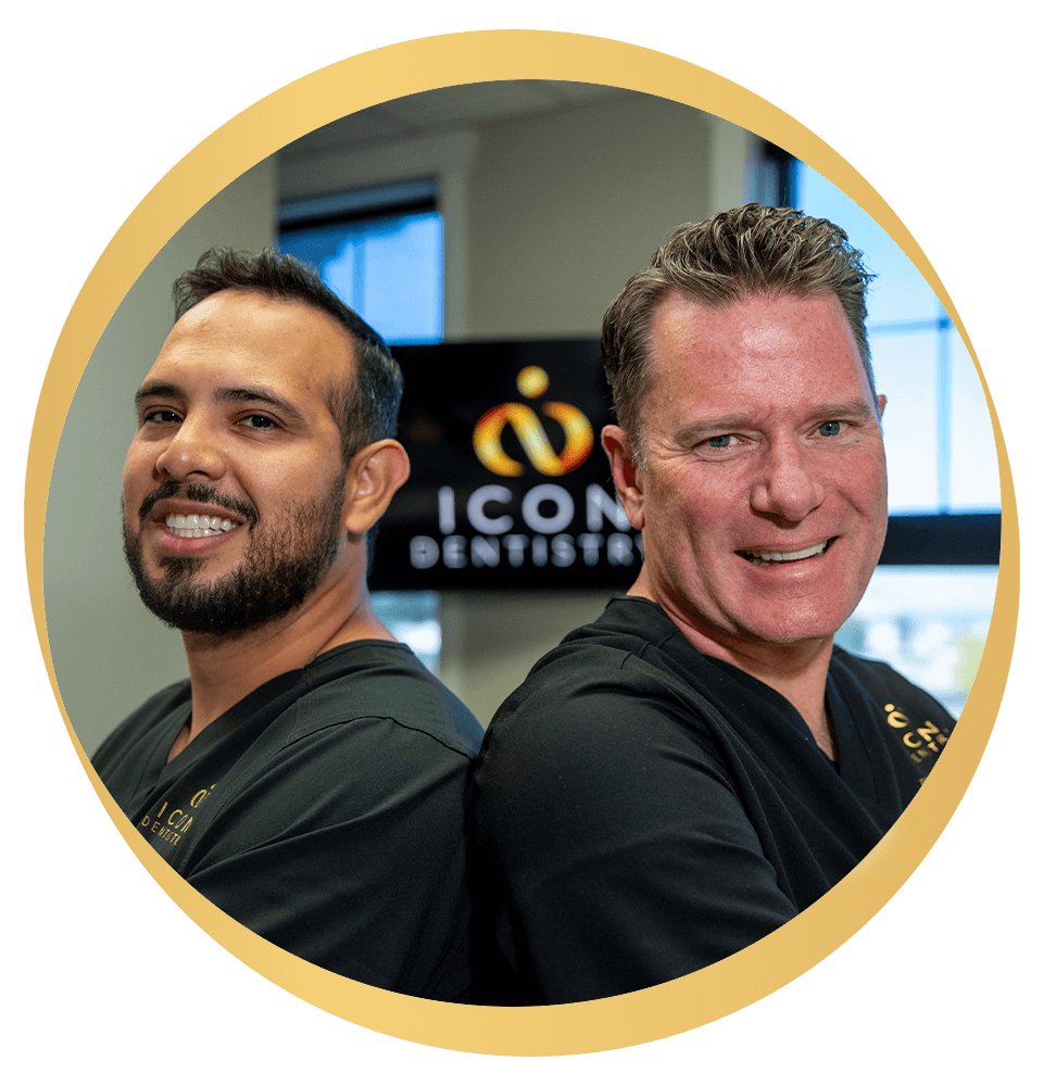 Doctors back to back smiling