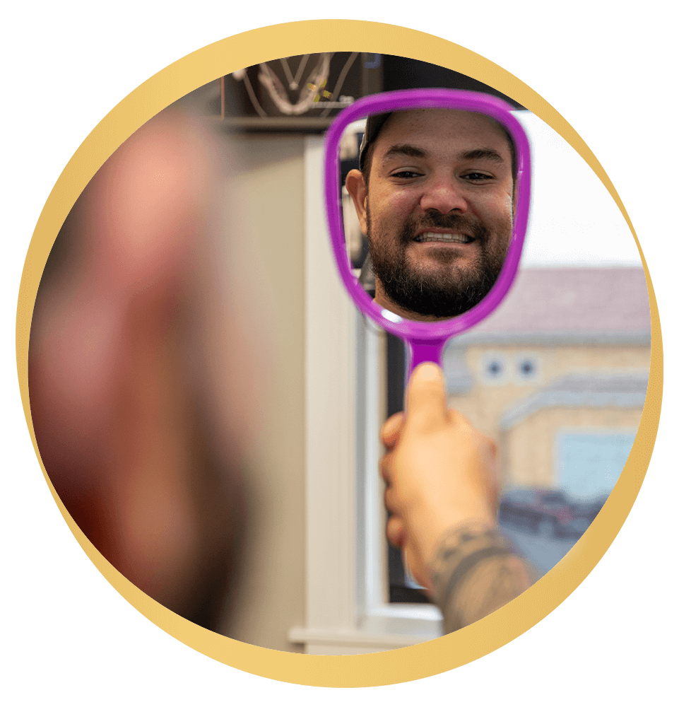 man looking into mirror